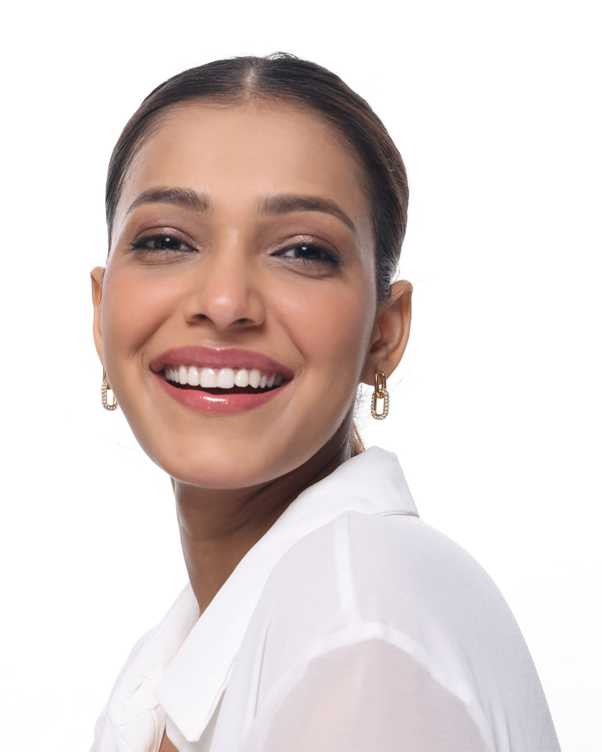 Gold hoop earrings by Sucra