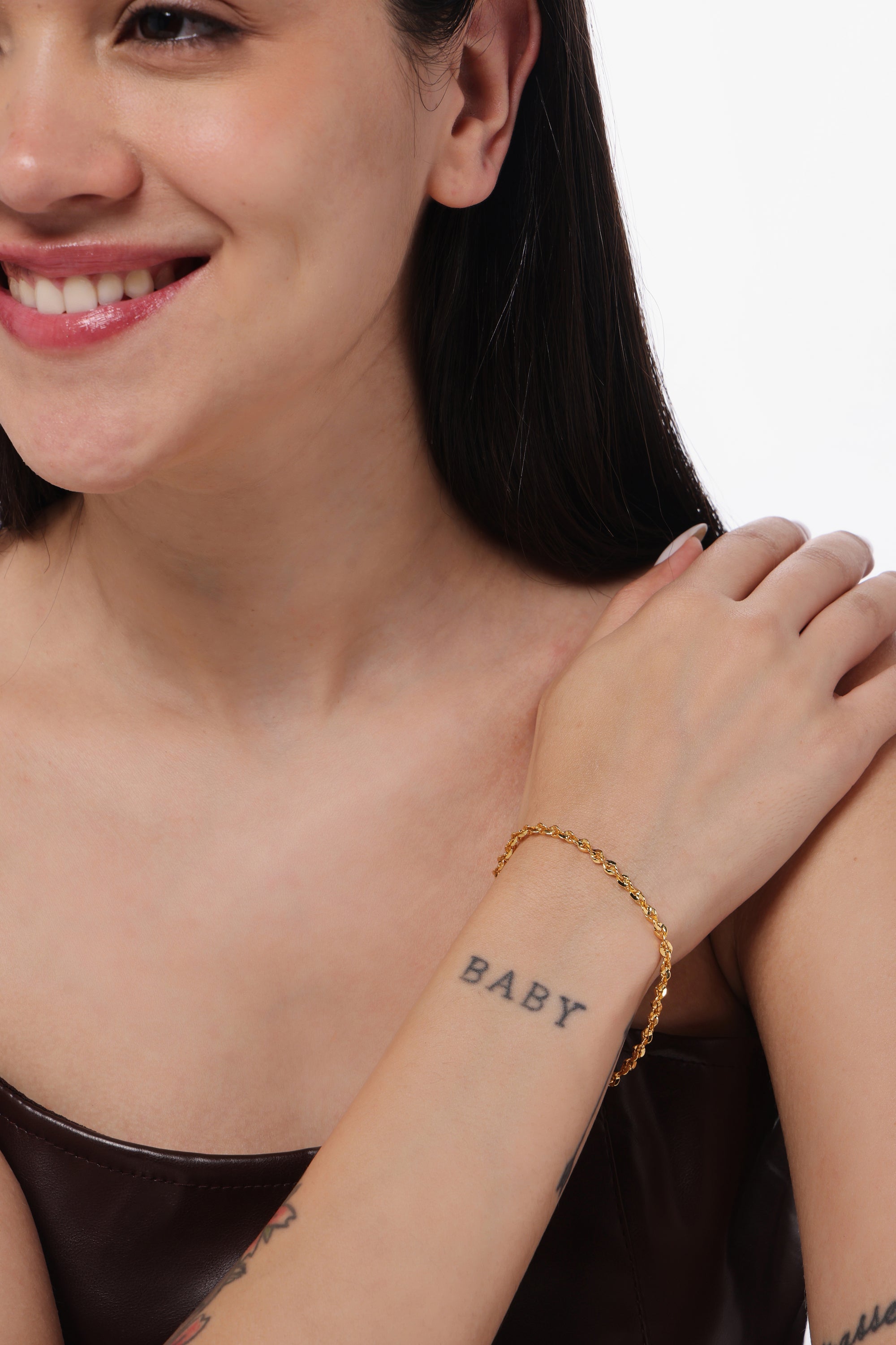 Shimmer Link Bracelet — model shot, 14K gold-plated recycled brass bracelet by Sucra