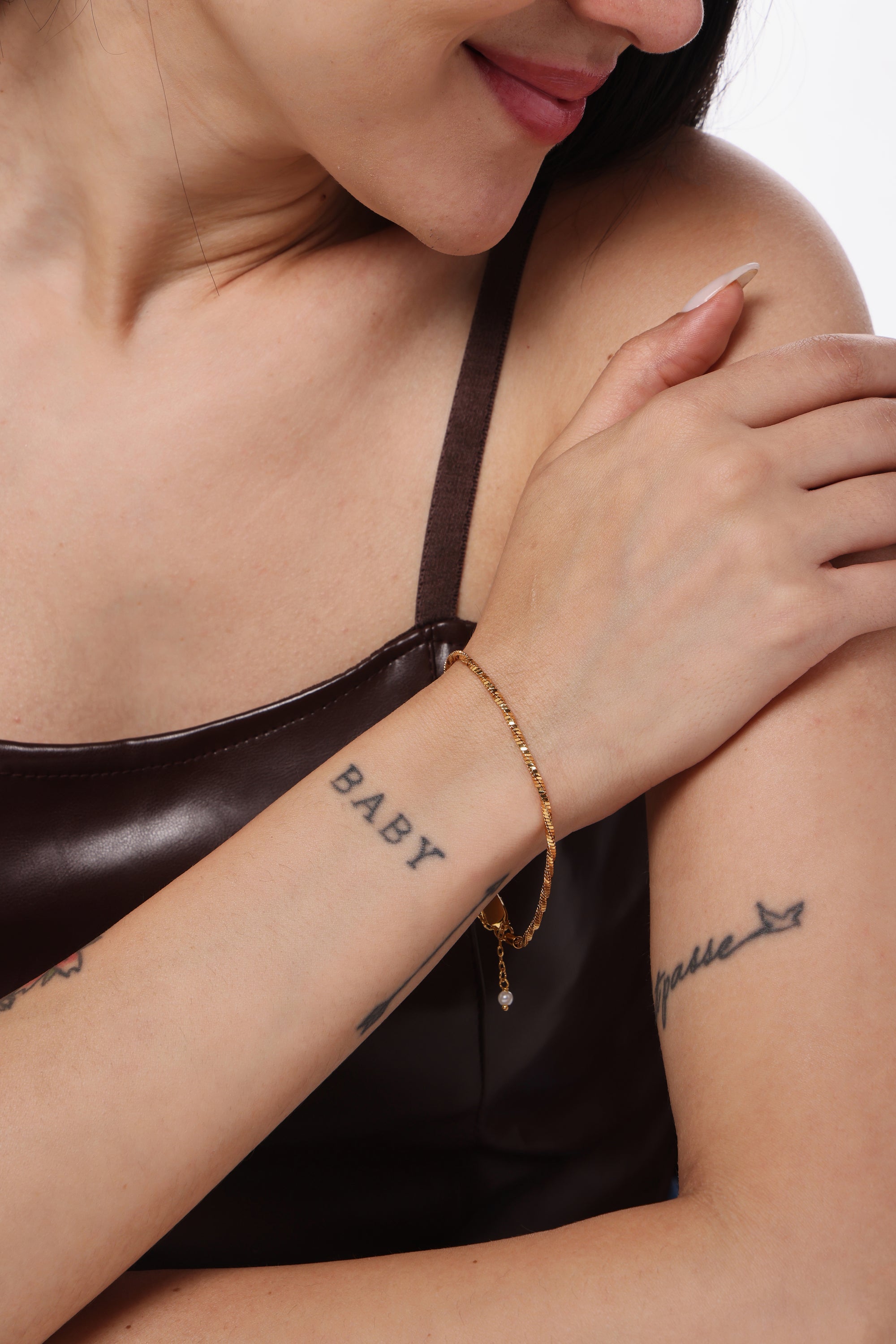 The Twist Snake Set - model shot, gold twist snake bracelet by Sucra