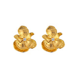 Impression of Blossom Earrings - gold flower stud earrings with a clear stone by Sucra