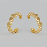 Pebble Hoop Earrings - gold molten pebble hoop earrings by Sucra