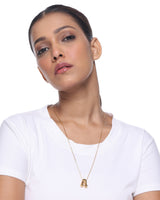 Form Letter Necklace - model shot, gold bubble letter pendant on a fine chain by Sucra